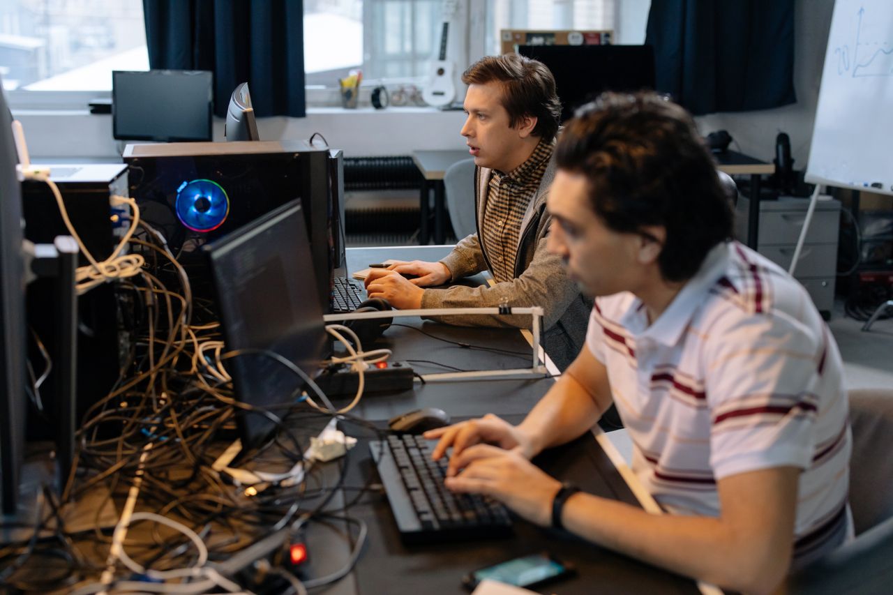 IT professional analysing business technology performance, costs and potential risks